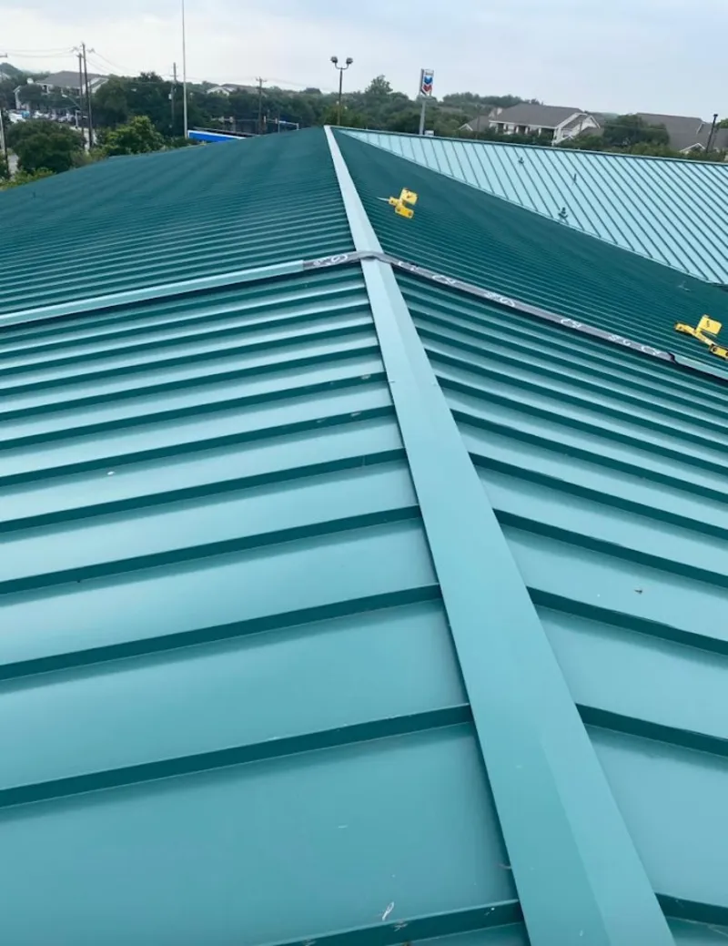 Green commercial metal roof ridge and valley for Metal Roof Repair in Avon Park